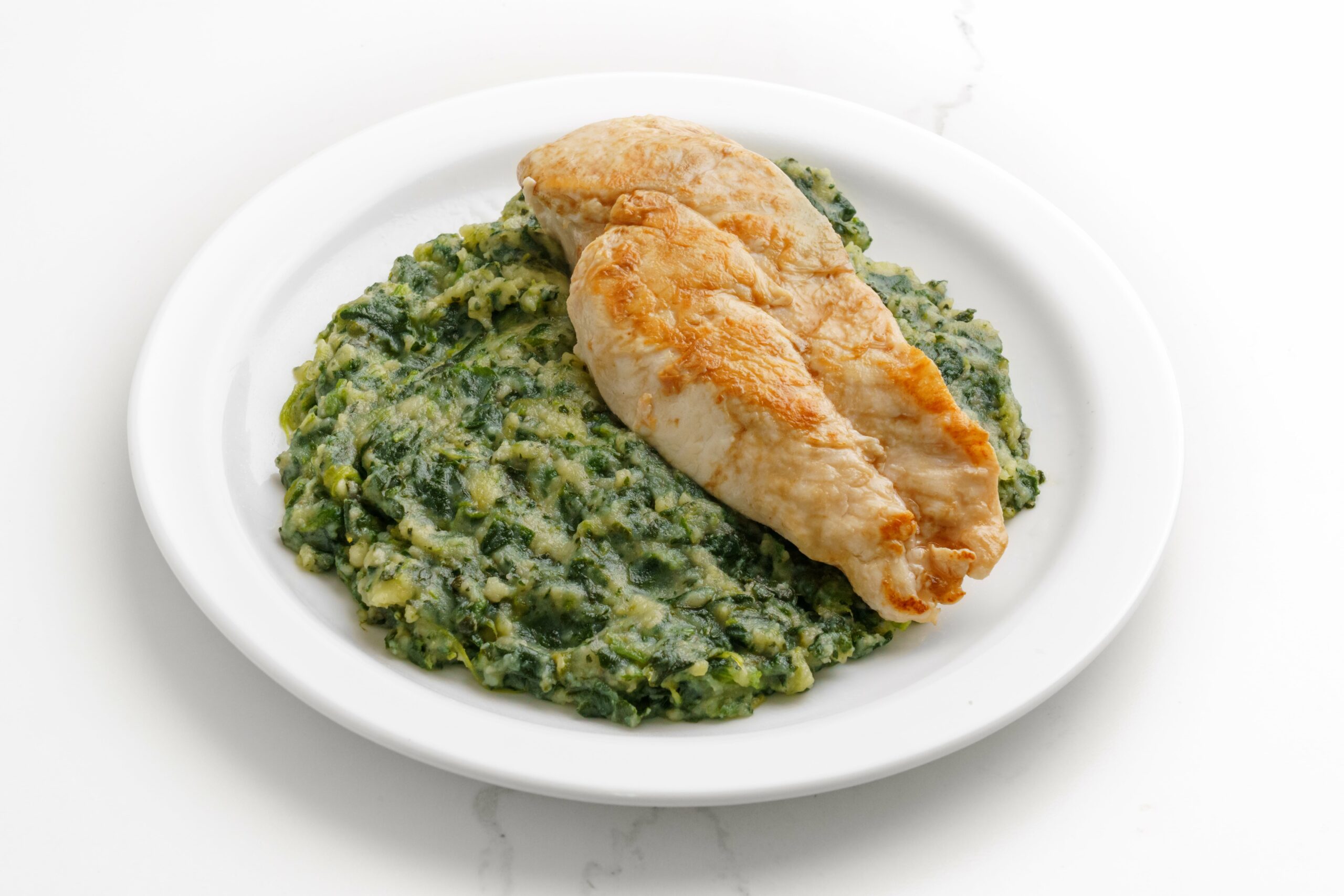 Pechuga de pollo con pure florentina